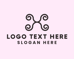 Decorative Curly Letter X logo