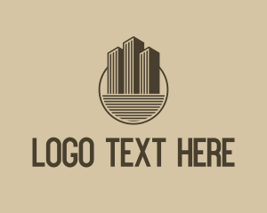 Minimalist Tower Real Estate logo