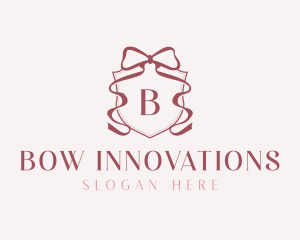 Ribbon Bow Crest logo