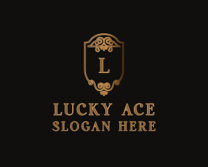 Gold Ornate Crest Letter logo design