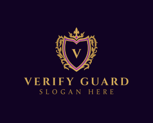 Elegant Crown Shield Crest logo design