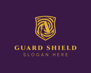 Gold Spiral Shield Letter A logo