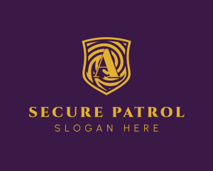 Gold Spiral Shield Letter A logo