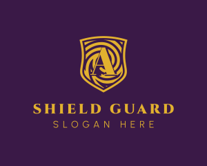 Gold Spiral Shield Letter A logo