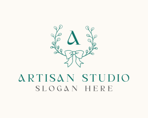 Ribbon Leaf Wreath logo design