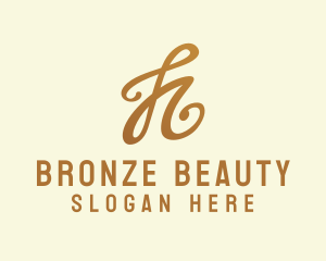 Elegant Bronze Letter H logo