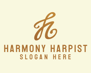 Elegant Bronze Letter H logo design