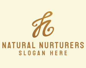 Elegant Bronze Letter H logo design