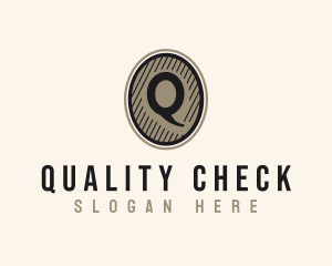 Etched Oval Coin Letter Q logo design