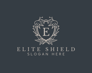 Elegant Wreath Shield logo design