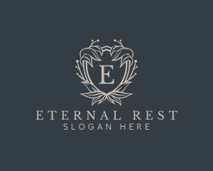 Elegant Wreath Shield logo design