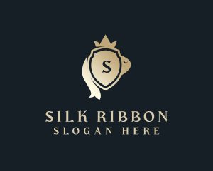 Crown Shield Ribbon Lettermark logo design