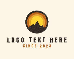 Vintage - Rustic Mountain Sunset Badge logo design