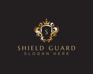 Elegant Royalty Crown Shield logo design