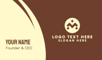 Brown Ethnic Pattern Letter M Business Card Design